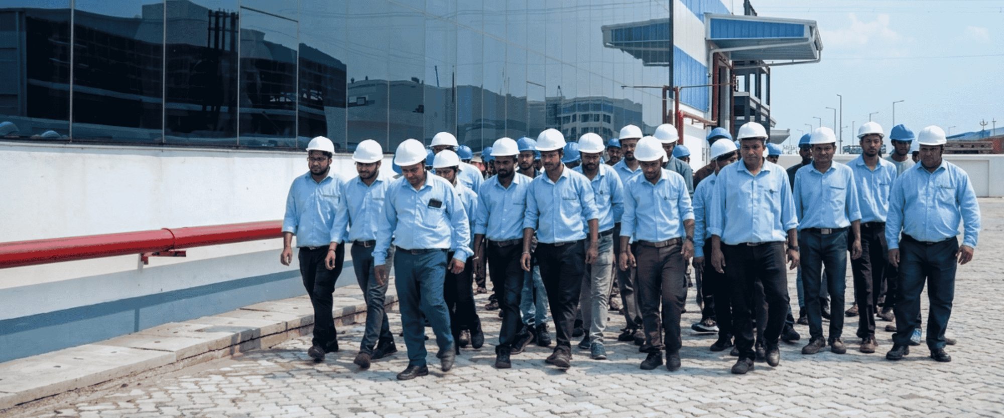 The Grow Ever team at the manufacturing facility